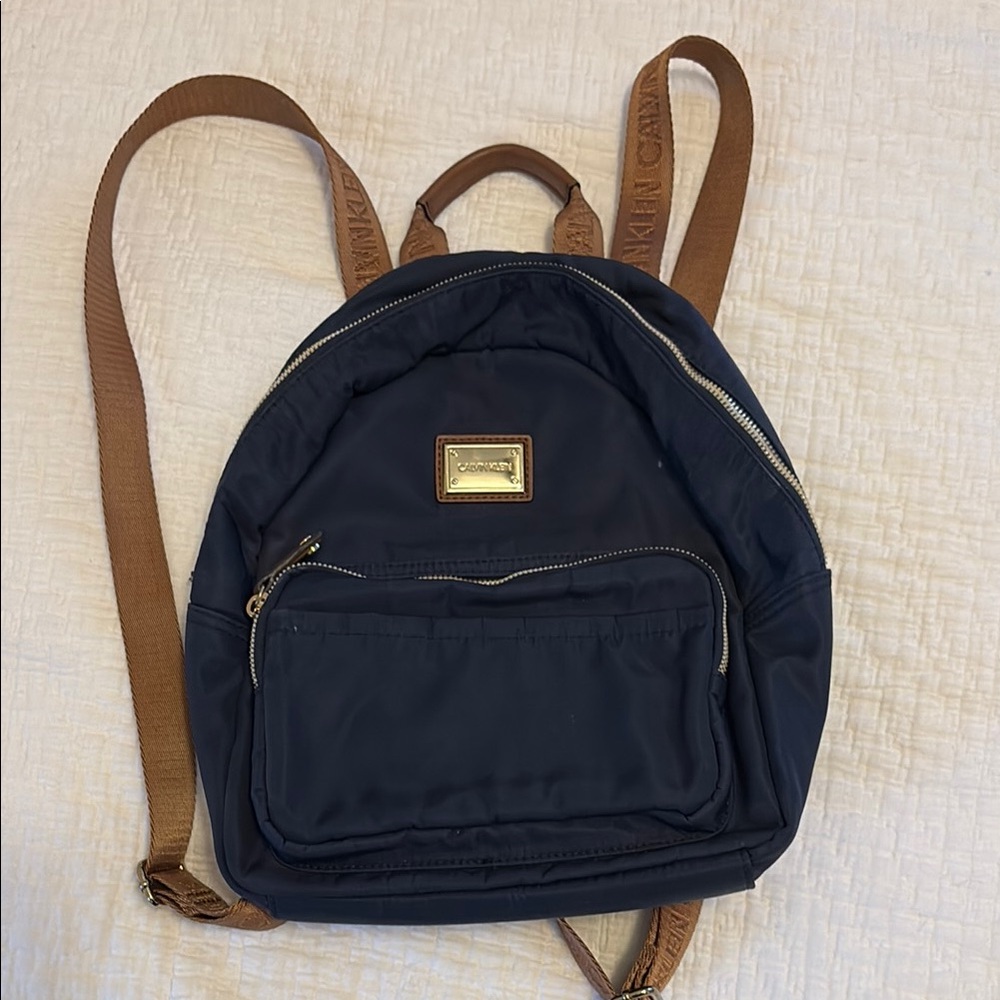 Calvin Klein Blue and Brown Backpack with Elegant Leather Accents